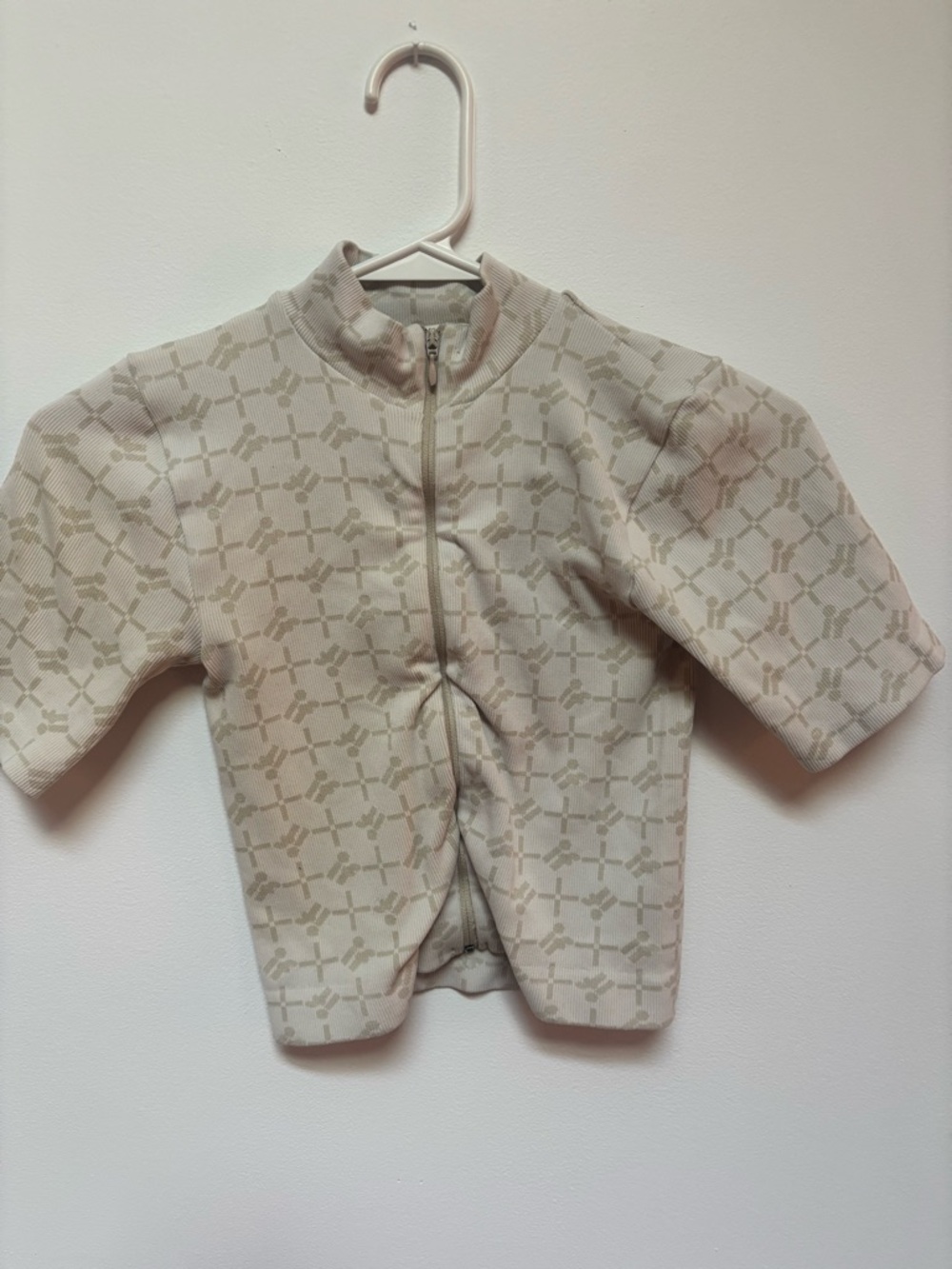 Urban Outfitters Neutral Geo Pattern Zip-Front Baby Crop Top - Cream